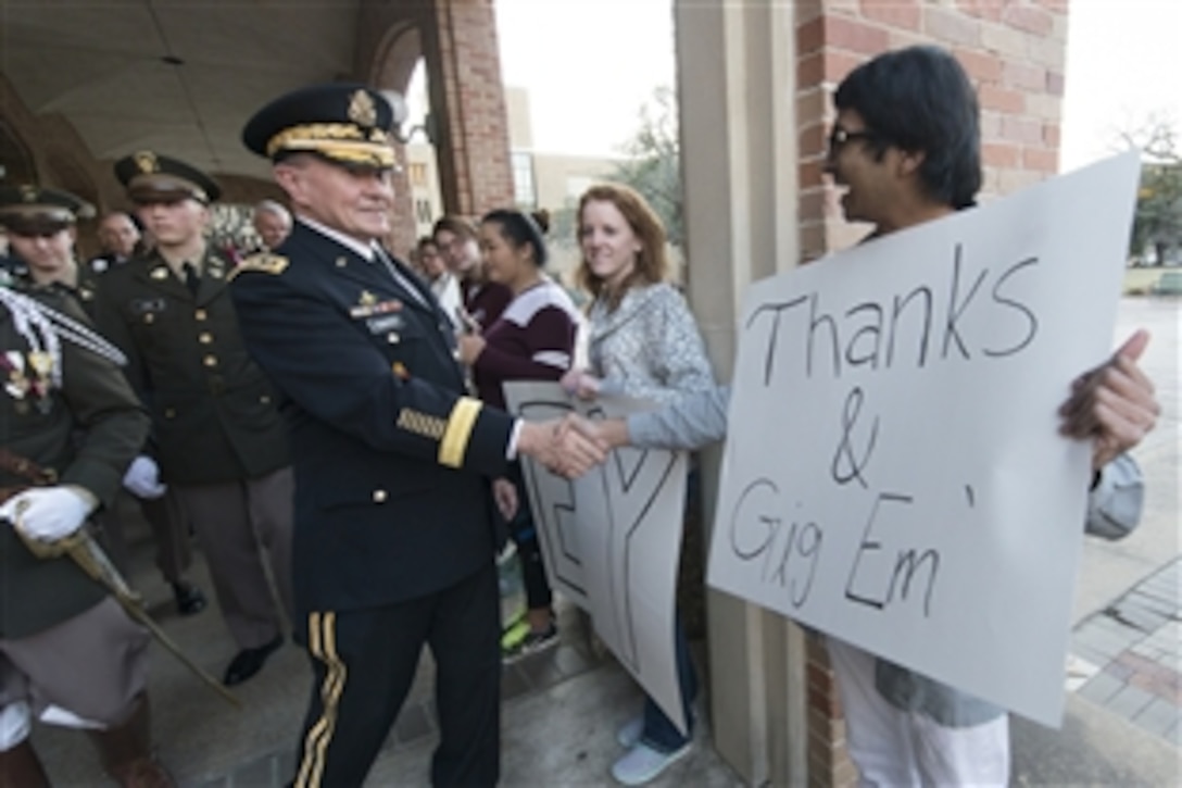 Army Gen. Martin E. Dempsey, chairman of the Joint Chiefs of Staff, shakes hands with Texas A&M University alumni in College Station, Texas, Feb. 18, 2015. DoD photo by D. Myles Cullen