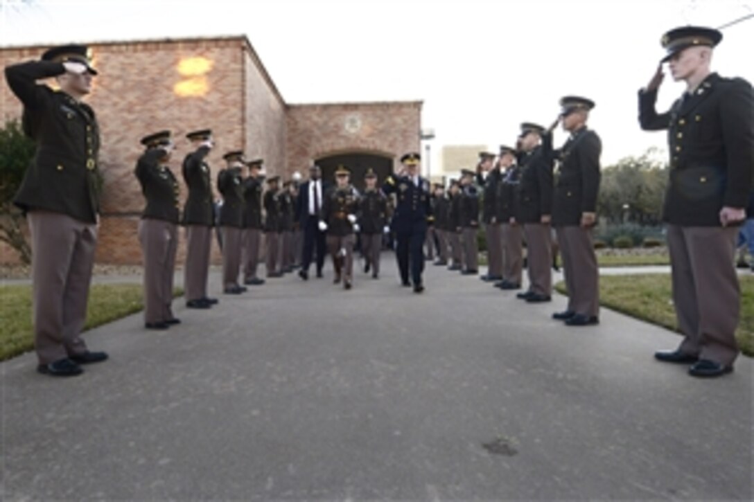 Members of the Corps of Cadets at Texas A&M University salute Army Gen. Martin E. Dempsey, chairman of the Joint Chiefs of Staff, upon his arrival in College Station, Texas, Feb. 18, 2015. Dempsey visited the university to meet with cadets and talk with them on a range of topics.