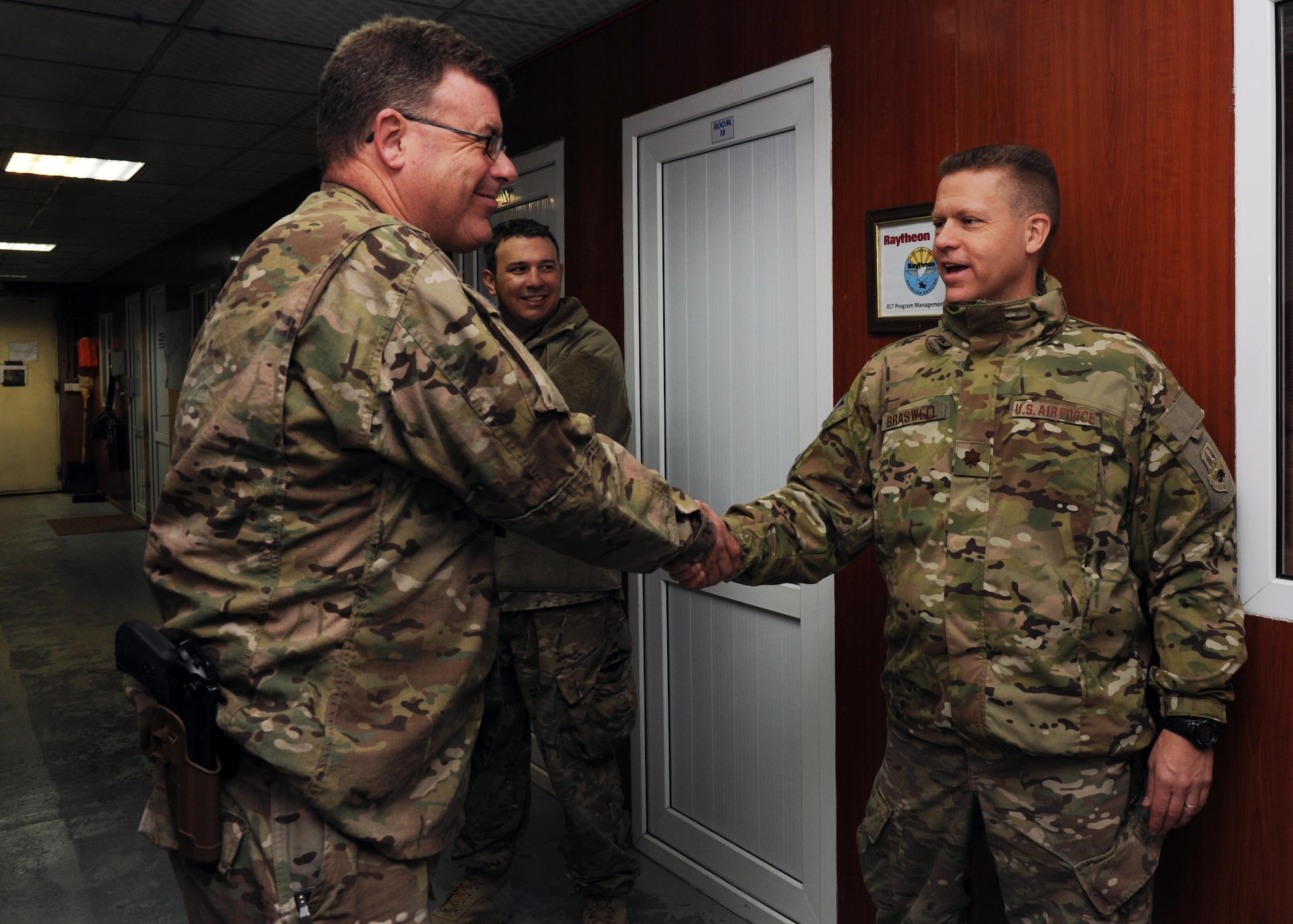 U.S. Air Force Maj. William Braswell, 455th Air Expeditionary Wing chaplain, meets with Airmen assigned to the 438th Air Expeditionary Wing during a Religious Support Team visit to Train, Advise, Assist Command-Air Feb. 15, 2015 at Forward Operating Base Oqab, Afghanistan. Braswell, accompanied by U.S. Air Force Tech. Sgt. Aleric Hebert, 455 AEW chaplain assistant, travels throughout the U.S. Air Force Central Command Area of Responsibility engaging with Airmen and conducting church services to ensure deployed servicemembers are spiritually fit to fight.(U.S. Air Force photo by Staff Sgt. Whitney Amstutz/released)