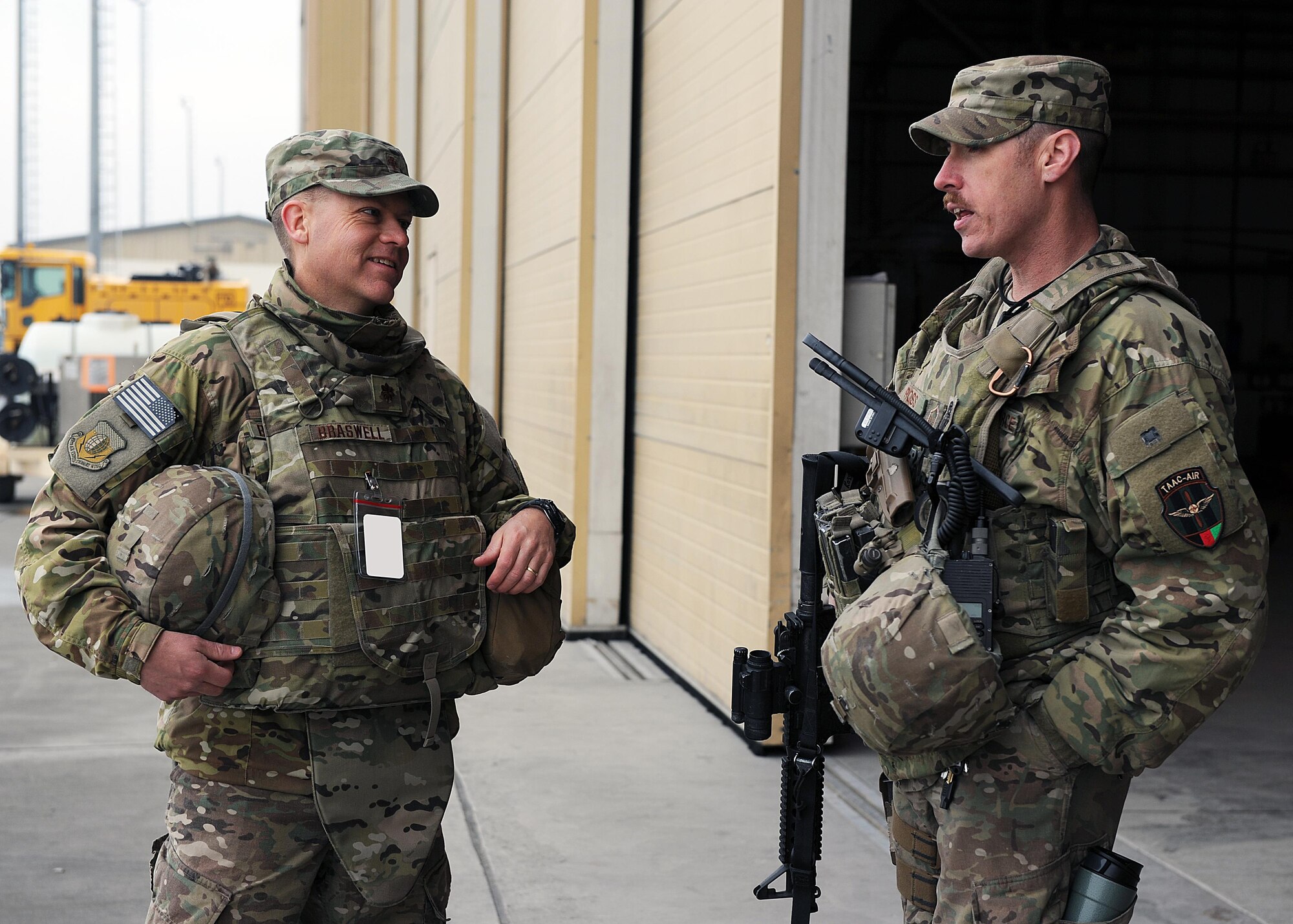 U.S. Air Force Maj. William Braswell, 455th Air Expeditionary Wing chaplain, speaks with U.S. Air Force Master Sgt. James Ross, 438th Air Expeditionary Wing, during a Religious Support Team visit to Train, Advise, Assist Command-Air Feb. 15, 2015 at Forward Operating Base Oqab, Afghanistan. Braswell, accompanied by U.S. Air Force Tech. Sgt. Aleric Hebert, 455 AEW chaplain assistant, travels throughout the U.S. Air Force Central Command Area of Responsibility engaging with Airmen and conducting church services to ensure deployed servicemembers are spiritually fit to fight.(U.S. Air Force photo by Staff Sgt. Whitney Amstutz/released)