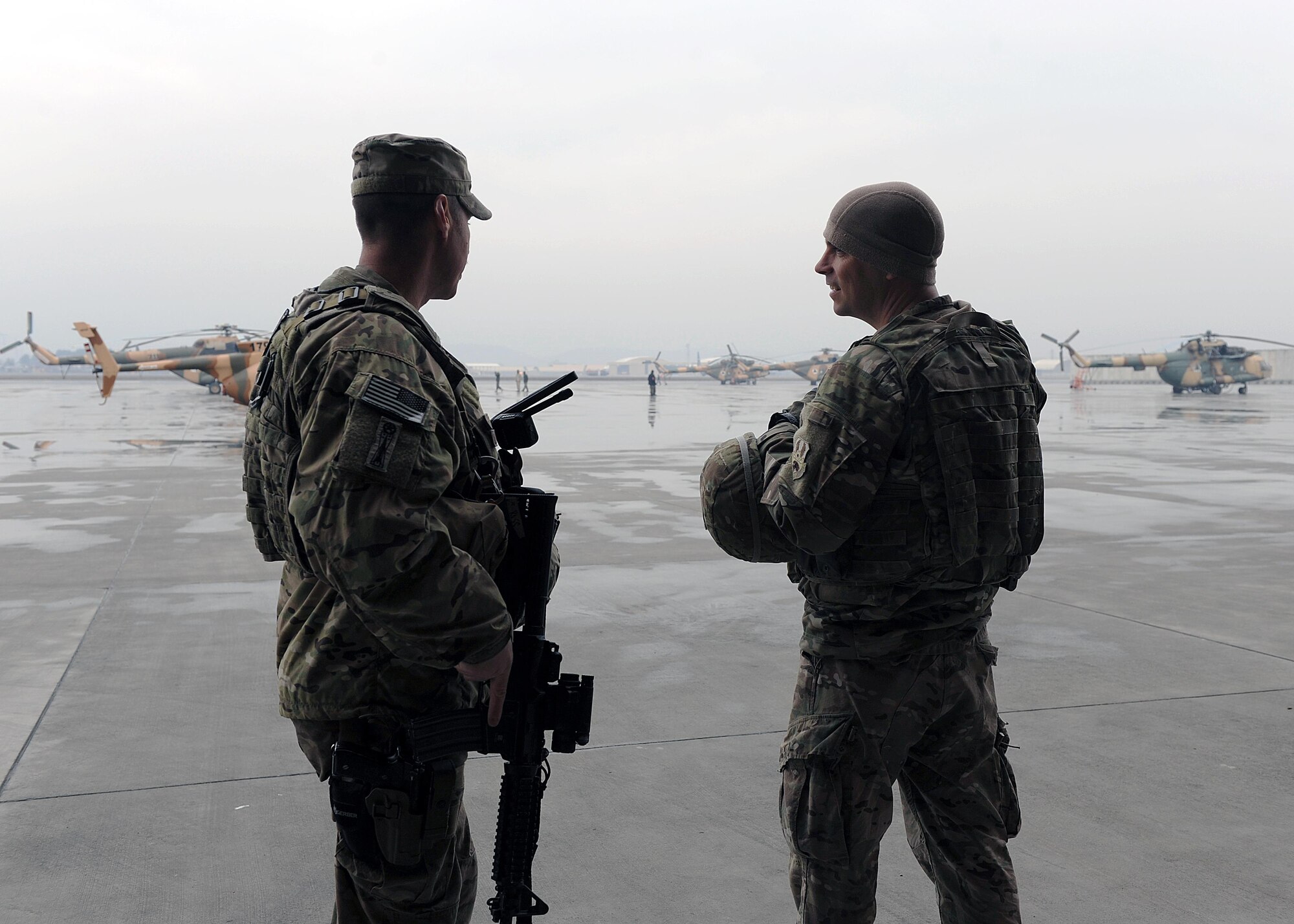 U.S. Air Force Tech. Sgt. Aleric Hebert, 455th Air Expeditionary Wing chaplain assistant, speaks with U.S. Air Force Master Sgt. James Ross, 438th Air Expeditionary Wing, during a Religious Support Team visit to Train, Advise, Assist Command-Air Feb. 15, 2015 at Forward Operating Base Oqab, Afghanistan. Hebert, accompanied by U.S. Air Force Maj. William Braswell, 455 AEW chaplain, travels throughout the U.S. Air Force Central Command Area of Responsibility engaging with Airmen and conducting church services to ensure deployed servicemembers are spiritually fit to fight.(U.S. Air Force photo by Staff Sgt. Whitney Amstutz/released)