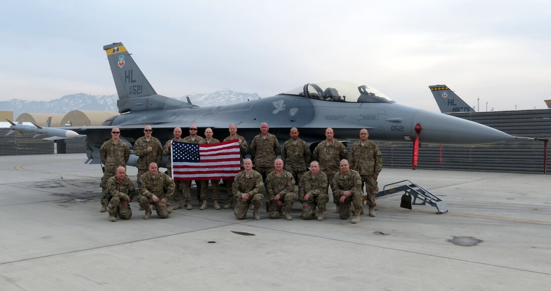 Deployed Airmen pose with freshly shaved heads to show support of a Utah boy battling cancer. About 30 Airmen participated in the “Lose It for Landon” campaign during their six-month deployment to Bagram Airfield, Afghanistan. (Courtesy photo) 
