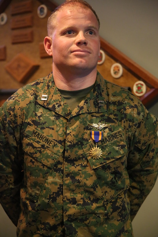 Capt. William Mahoney received the Air Medal during a ceremony at Marine Corps Air Station Cherry Point, N.C., Feb. 12, 2015, for his actions during an aircraft malfunction of his front landing gear while flying missions in the U.S. 6th Fleet area of operations to augment U.S. Crisis Response forces while serving as an AV-8B Harrier pilot assigned to Marine Medium Tiltrotor Squadron 263 (Reinforced), 22nd Marine Expeditionary Unit, aboard the USS Bataan, at sea, June 2014. Mahoney is a native of Athens, Ga.