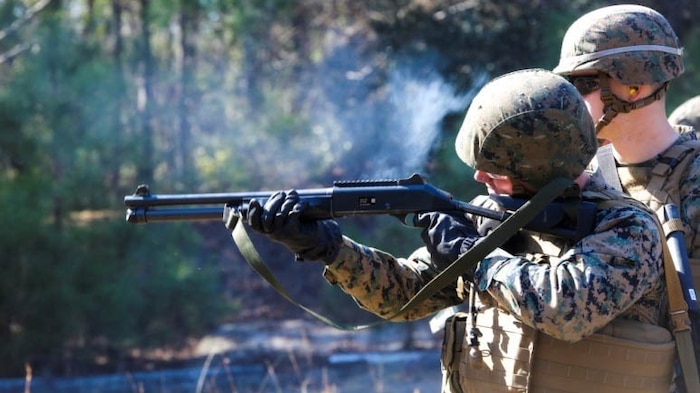 Combat engineers with 8th Engineer Support Battalion, 2nd Marine Logistics Group, 2nd Marine Expeditionary Force, shoot the Benelli M4 Super 90 shotgun at Engineer Training Area 1 aboard Marine Corps Base Camp Lejeune, N.C., Feb. 12, 2015. Before breaching with the shotgun, Marines took their time simply familiarizing themselves with the weapon in order to find a comfort level with it, before moving on to entering doorways with it.
