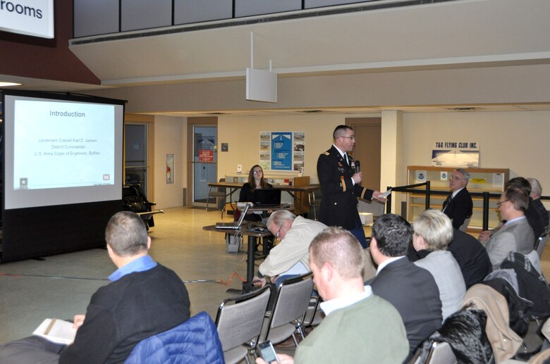 U.S. Army Corps of Engineers, Buffalo District Commander LTC Karl Jansen provides opening remarks at the public hearing regarding the dredging of Cleveland Harbor at Burke Front Airport, Cleveland, OH, February, 19, 2015. 