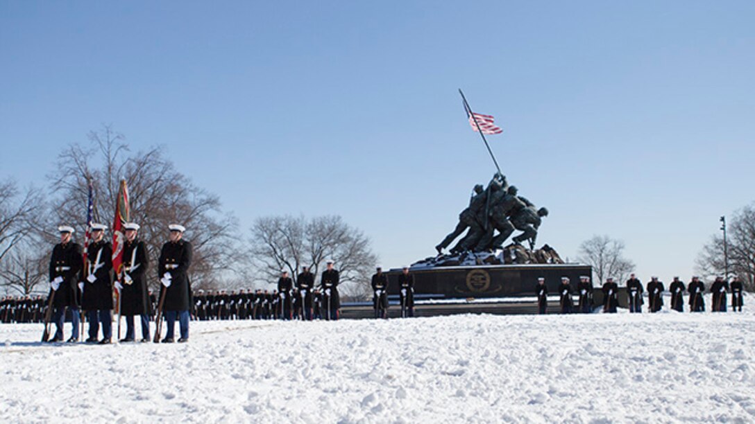 Sergeant Major Micheal Barrett, the 17th sergeant major of the Marine Corps, relinquished his post to Sergeant Major Ronald Green, the 18th sergeant major of the Marine Corps, during a ceremony at the Marine Corps War Memorial, Arlington, Virginia, Feb. 20, 2015. Green served as sergeant major of I Marine Corps Expeditionary Force before becoming the 18th sergeant major of the Marine Corps.