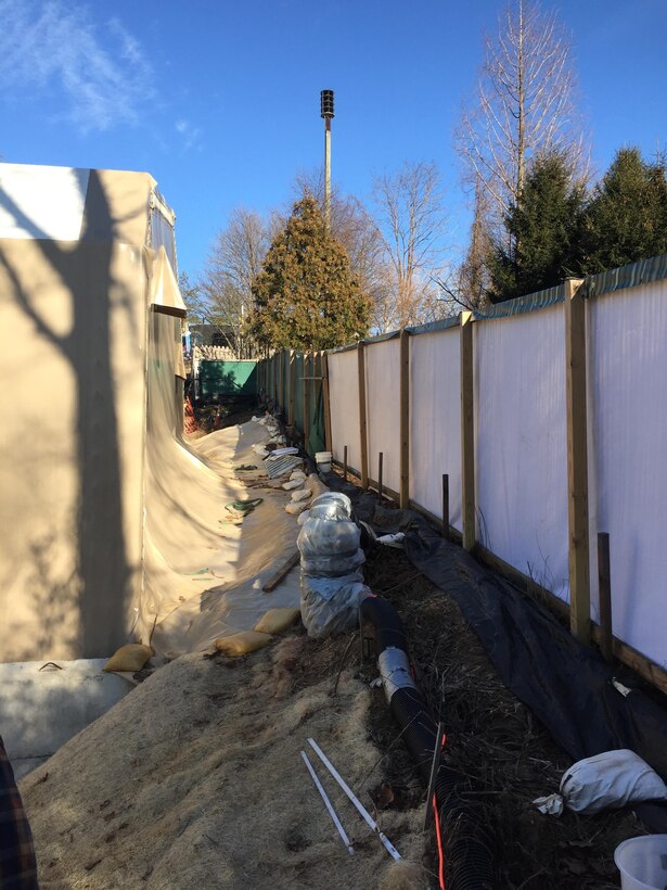 Crews installed new fencing at the 4825 Glenbrook Road project site. 