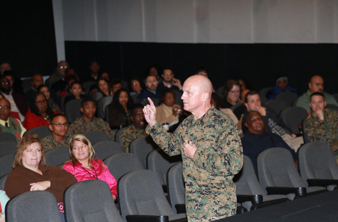 SgtMaj Joseph Davenport, LOGCOM, provides opening remarks at the Back in the Saddle Operational Pause held at the Base Theatre aboard Marine Corps Logistics Base on 14 January 2015. 