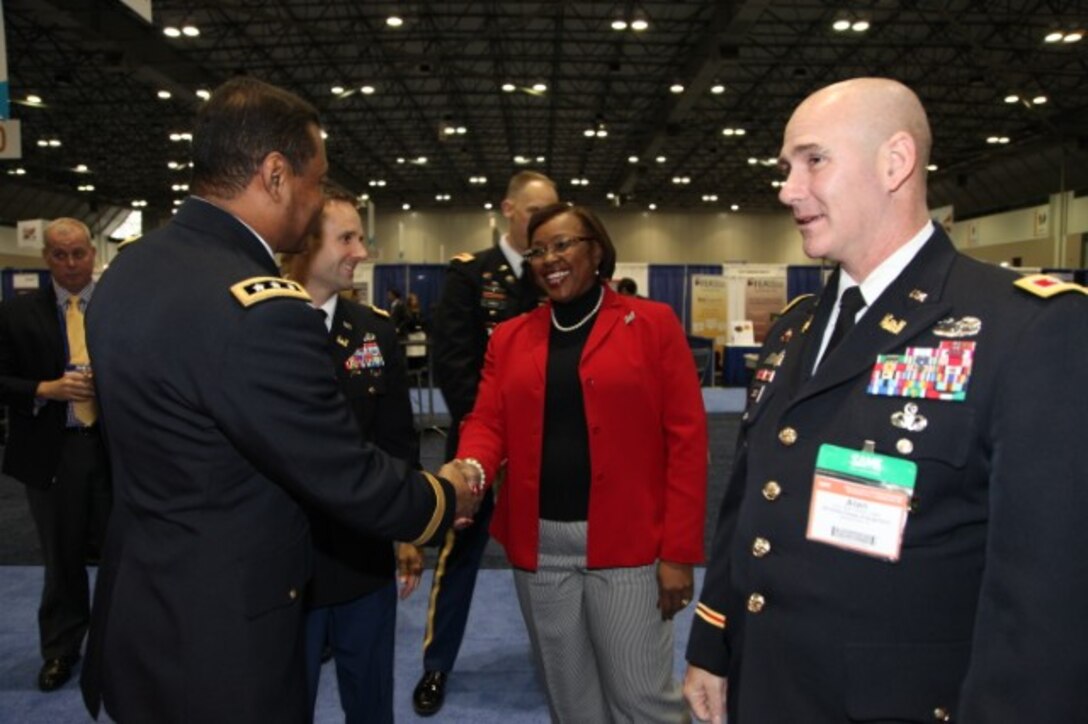 Lt. Gen. Bostick greeting Rose M. Smalls.
