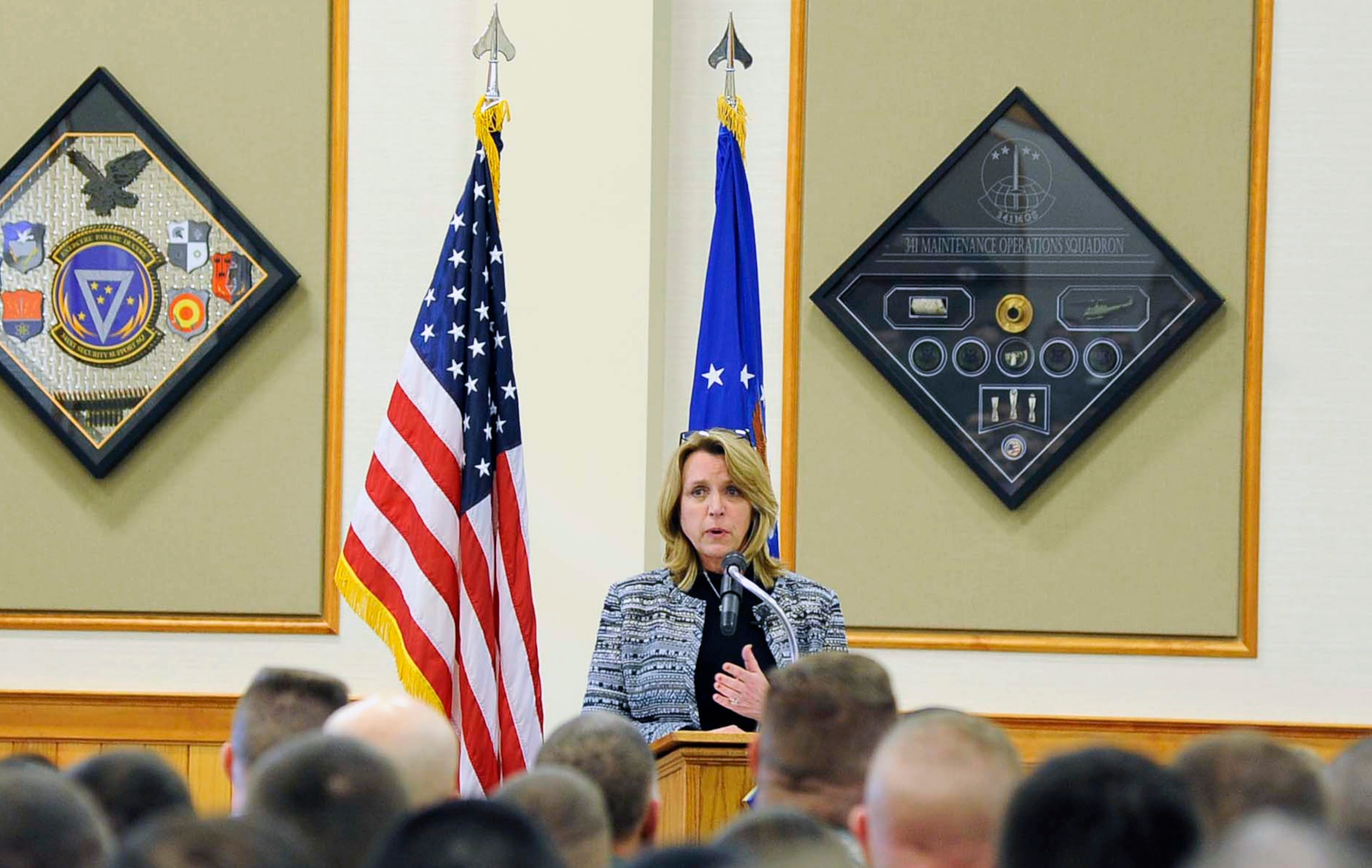 Secretary of the Air Force Deborah Lee James addresses Airmen during an all call Feb. 19, 2015, at Malmstrom Air Force Base, Mont. James spoke about Air Force Global Strike Command’s Force Improvement Program successes and the future of the nuclear mission. (U.S. Air Force photo/ Staff Sgt. Delia Marchick)