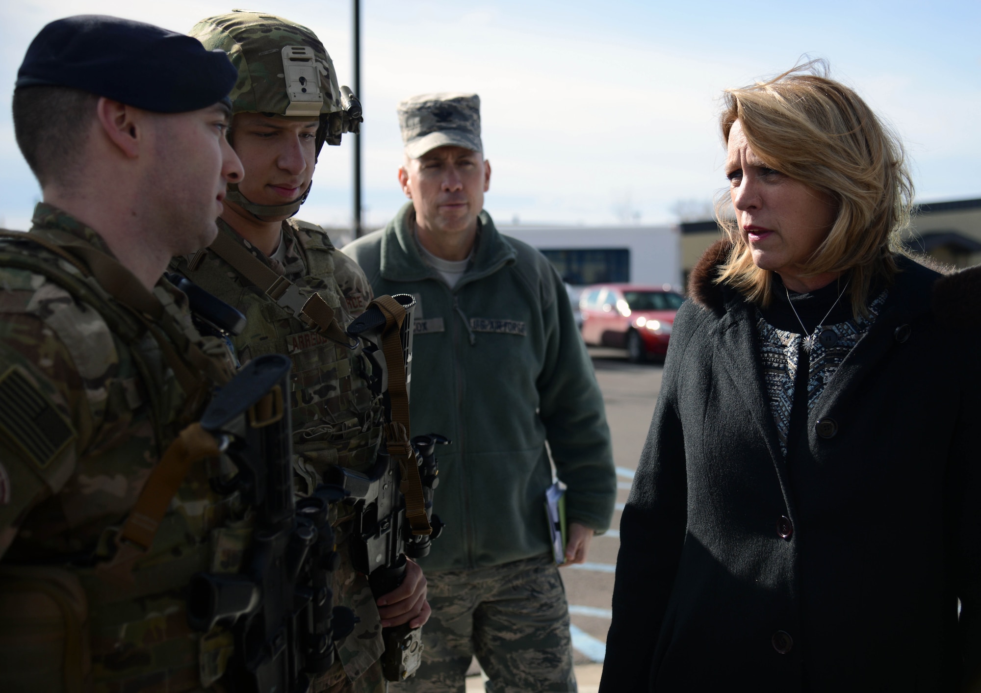 Secretary of the Air Force Deborah Lee James, right, speaks with Airmen Feb. 19, 2015, at Malmstrom Air Force Base, Mont. James visited Malmstrom to discuss its mission and to connect with the Airmen stationed there. (U.S. Air Force photo/Airman 1st Class Dillon Johnston)