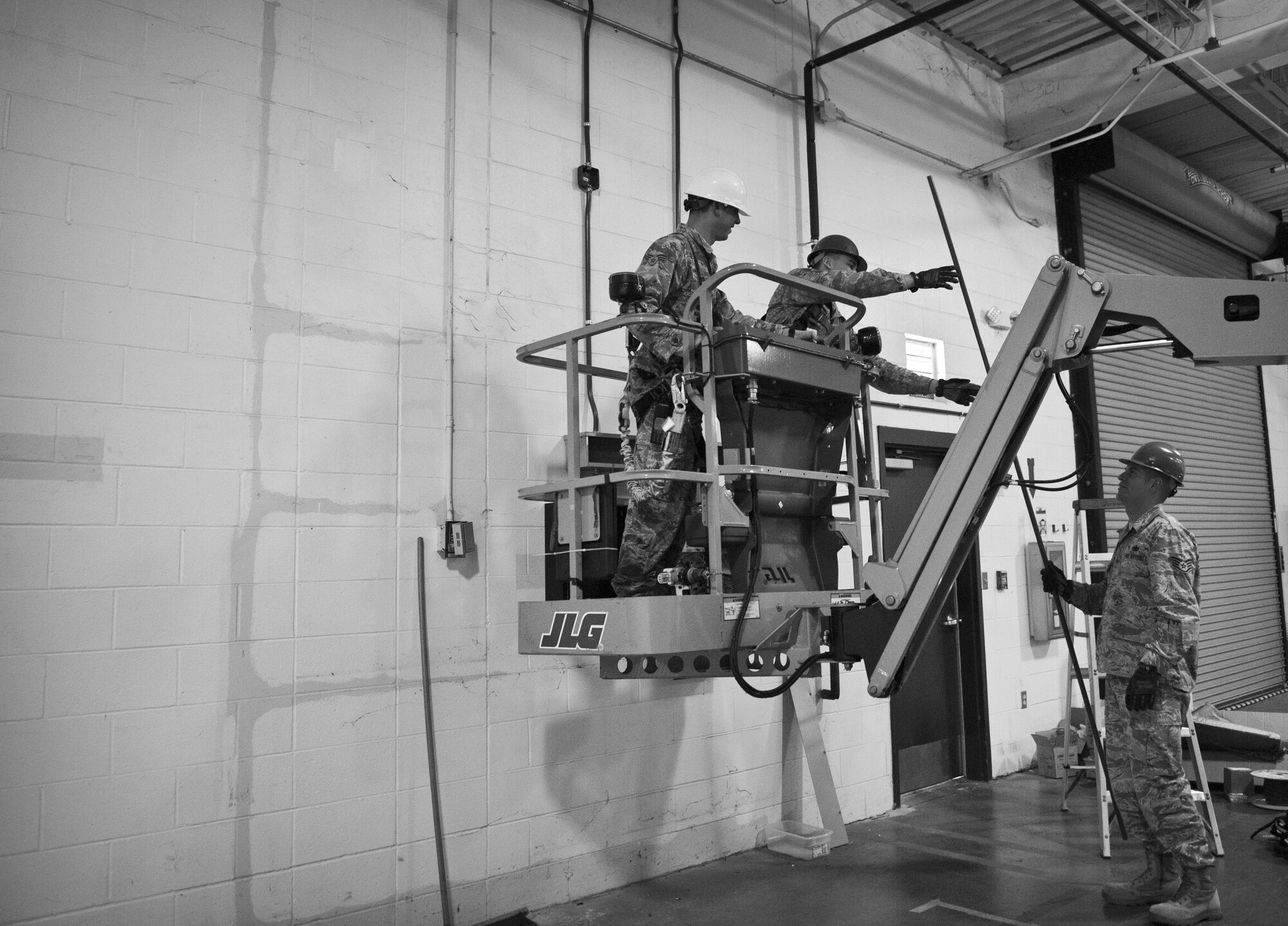 Airmen from the 1st Special Operations Civil Engineer Squadron life safety section, update a building’s fire system on Hurlburt Field, Fla., Feb. 18, 2015. In order for a building to be occupied, it must meet local fire codes. (U.S. Air Force photo/Senior Airman Krystal M. Garrett)