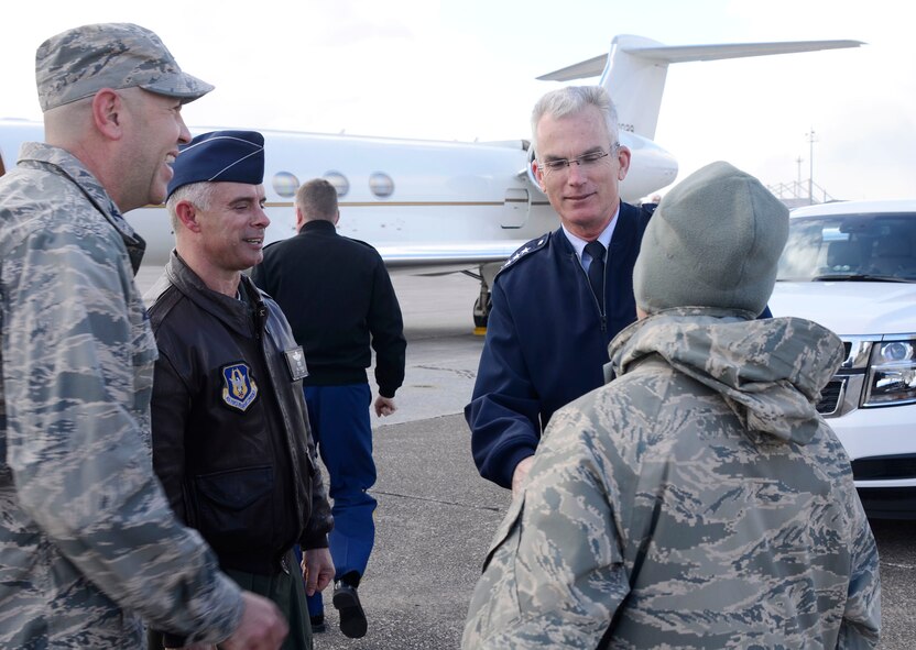 Col. Brent A. Merritt, 94th Airlift Wing Vice commander, Col. Paul E. Sprenkle, 94th AW director of programs, and Master Sgt. Charmone R. Newell, 94th AW Protocol NCOIC, greet Gen. Paul J. Selva, commander, U.S. Transportation Command upon landing at Dobbins Air Reserve Base, Ga. Feb. 17. Selva was scheduled to a speaking event in Atlanta, Ga. USTRANSCOM is the single manager for global air, land and sea transportation for the Department of Defense. (U.S. Air Force photo/Don Peek)