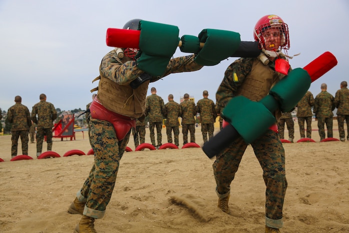 A recruit of Hotel Company, 2nd Recruit Training Battalion, hits a recruit with a killing blow at Marine Corps Recruit Depot San Diego, Jan. 28. Any strike to the head during the bout is an instant win for that recruit. 