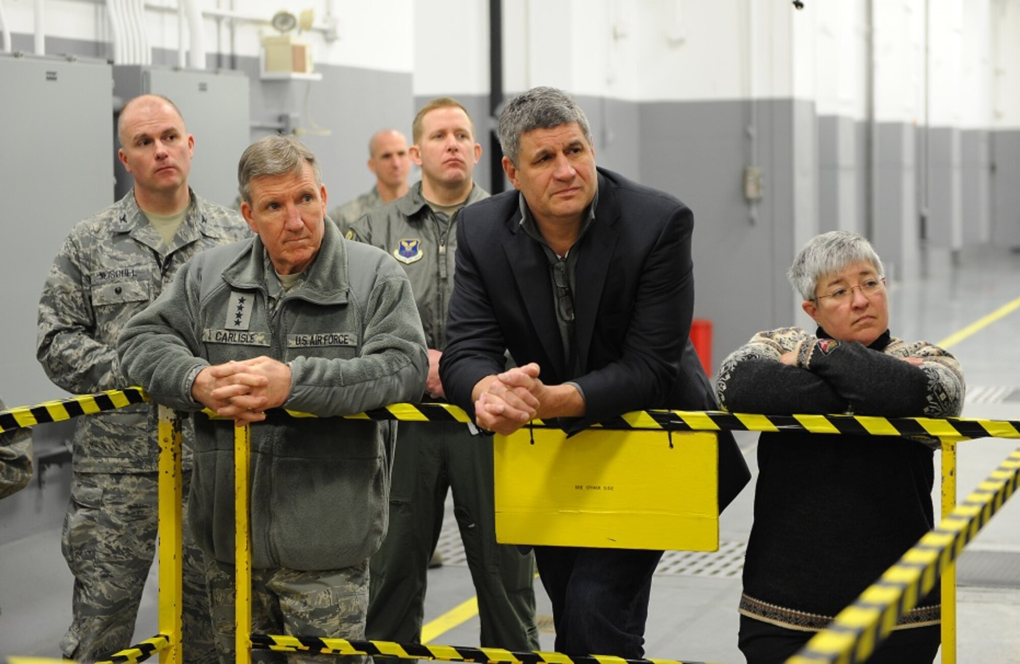 Members of the Nuclear Oversight Board listen as they are briefed about
equipment and procedures in the Weapons Storage Area on Minot Air Force
Base, N.D., Feb. 19, 2015. Air Force leadership were able to see first-hand
some of the aging equipment and infrastructure at Minot AFB that is in need
of upgrading. (U.S. Air Force photo/Senior Airman Kristoffer Kaubisch)