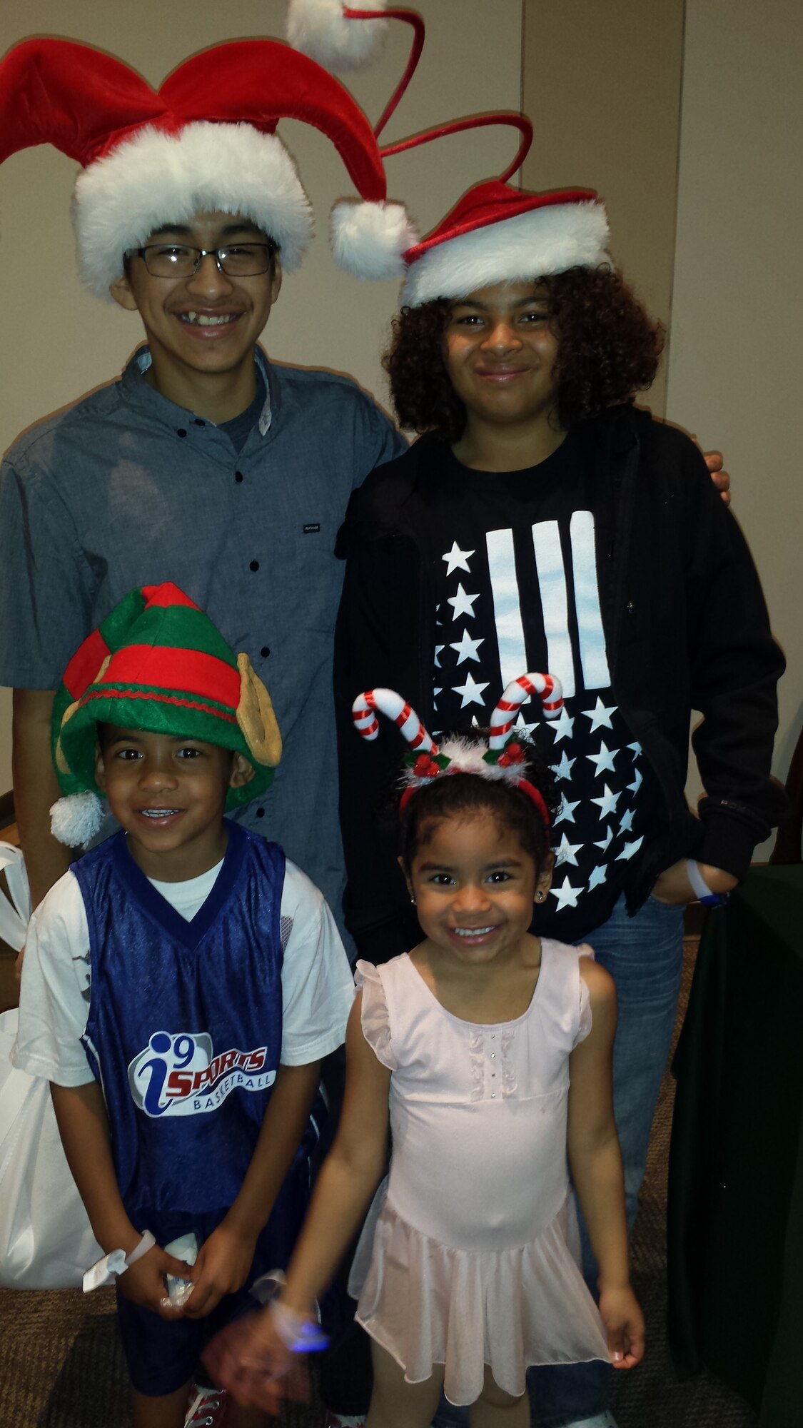 Ernesto Flores, Buckley's Military Youth of the Year, stands with his siblings during the holiday season. (courtesy photo)