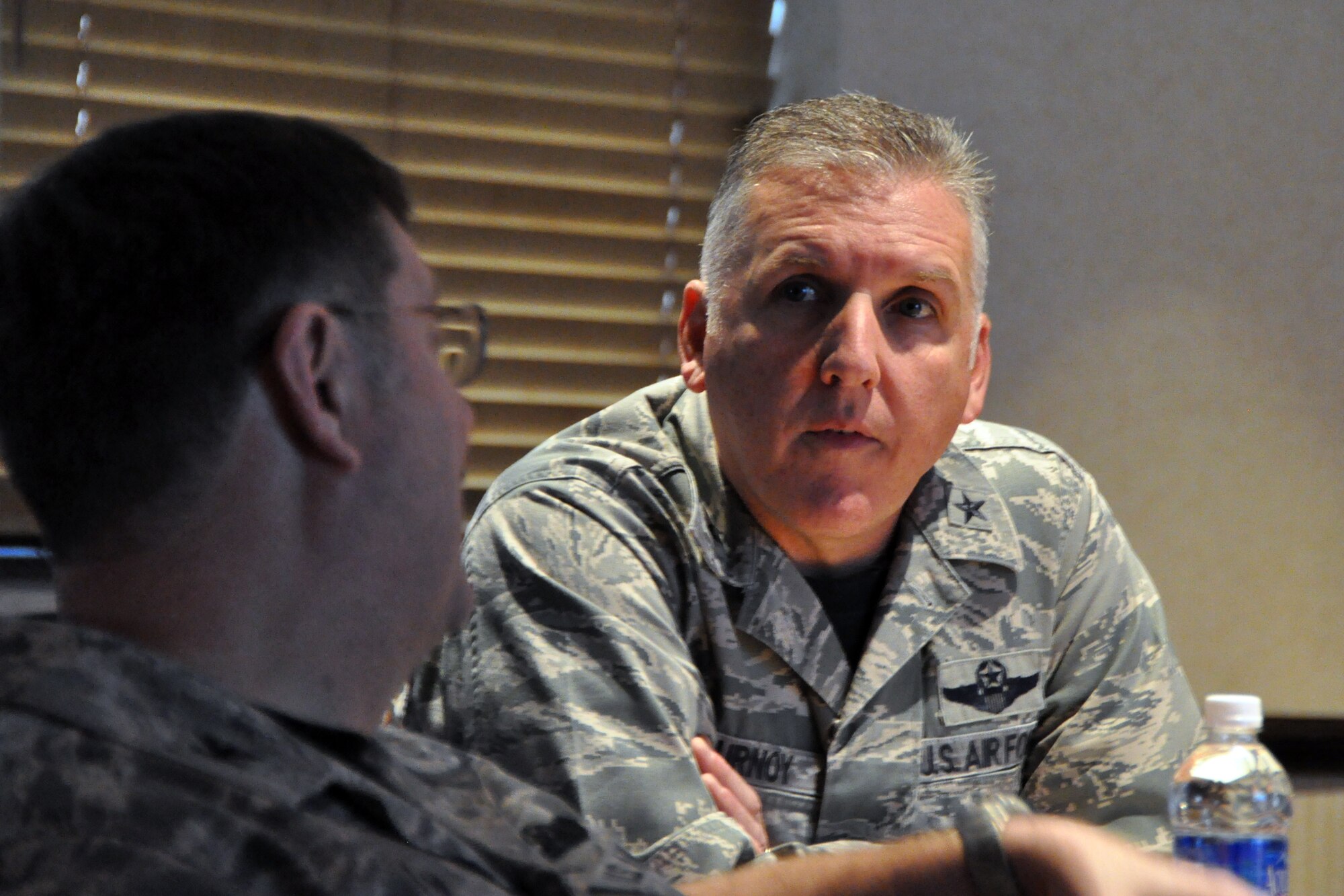 Brig. Gen. John Flournoy Jr., 4th Air Force commander, speaks with Col. Gregory Gilmour, 916th Air Refueling Wing commander, during a visit to Seymour Johnson Air Force Base, Jan. 9. Flournoy visited to meet 916th ARW personnel and to observe Team Seymour execute its Total Force mission. (USAF photo by MSgt. Wendy Lopedote, 916ARW/PA)