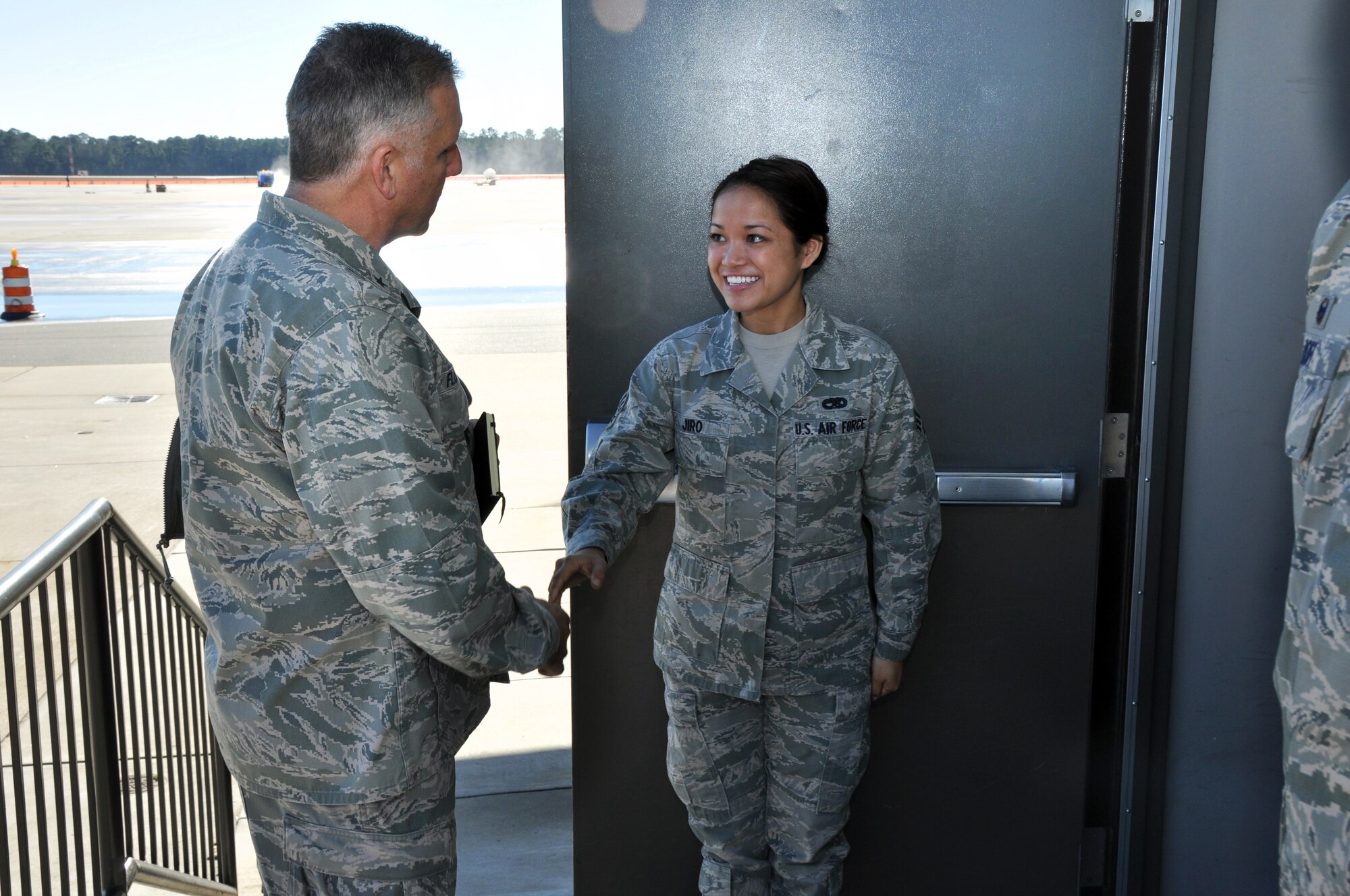 Brig. Gen. John Flournoy Jr., 4th Air Force commander, greets Senior Airman Jennilyn Jiro, 916th Aircraft Maintenance Squadron, while touring 916th Air Refueling Wing maintenance facilities during a visit to Seymour Johnson Air Force Base, Jan. 10. Flournoy visited to meet 916th ARW personnel and to observe Team Seymour execute its Total Force mission. (USAF photo by SSgt. Mark, Thompson, 916ARW/PA)