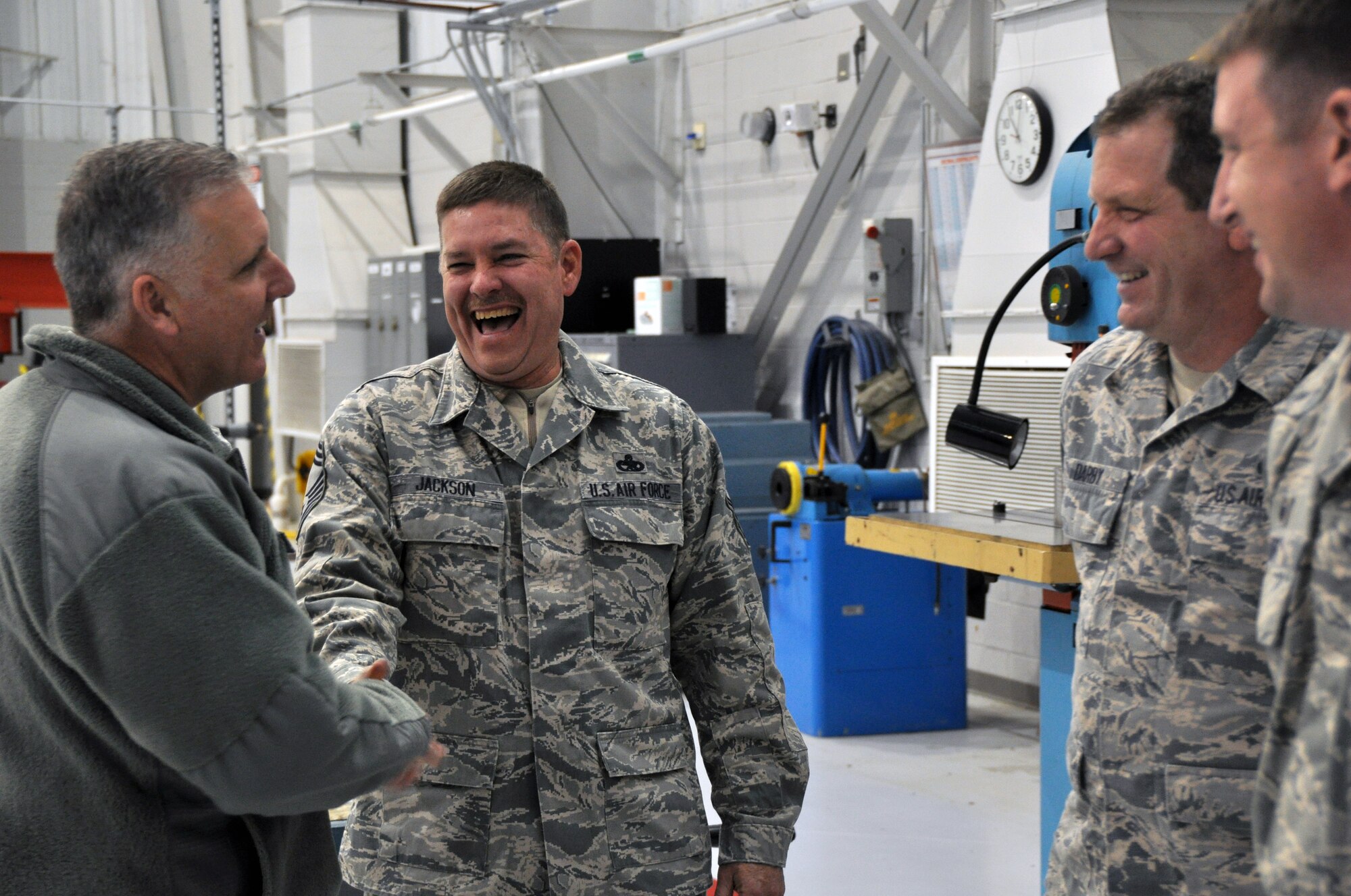 Brig. Gen. John Flournoy Jr., 4th Air Force commander, greets Chief Master Sgt. David Jackson, 916th Aircraft Maintenance Squadron superintendent, and other maintenance personnel during a visit to Seymour Johnson Air Force Base, Jan. 10. Flournoy visited to meet 916th Air Refueling Wing personnel and to observe Team Seymour execute its Total Force mission. (USAF photo by SSgt. Mark, Thompson, 916ARW/PA)