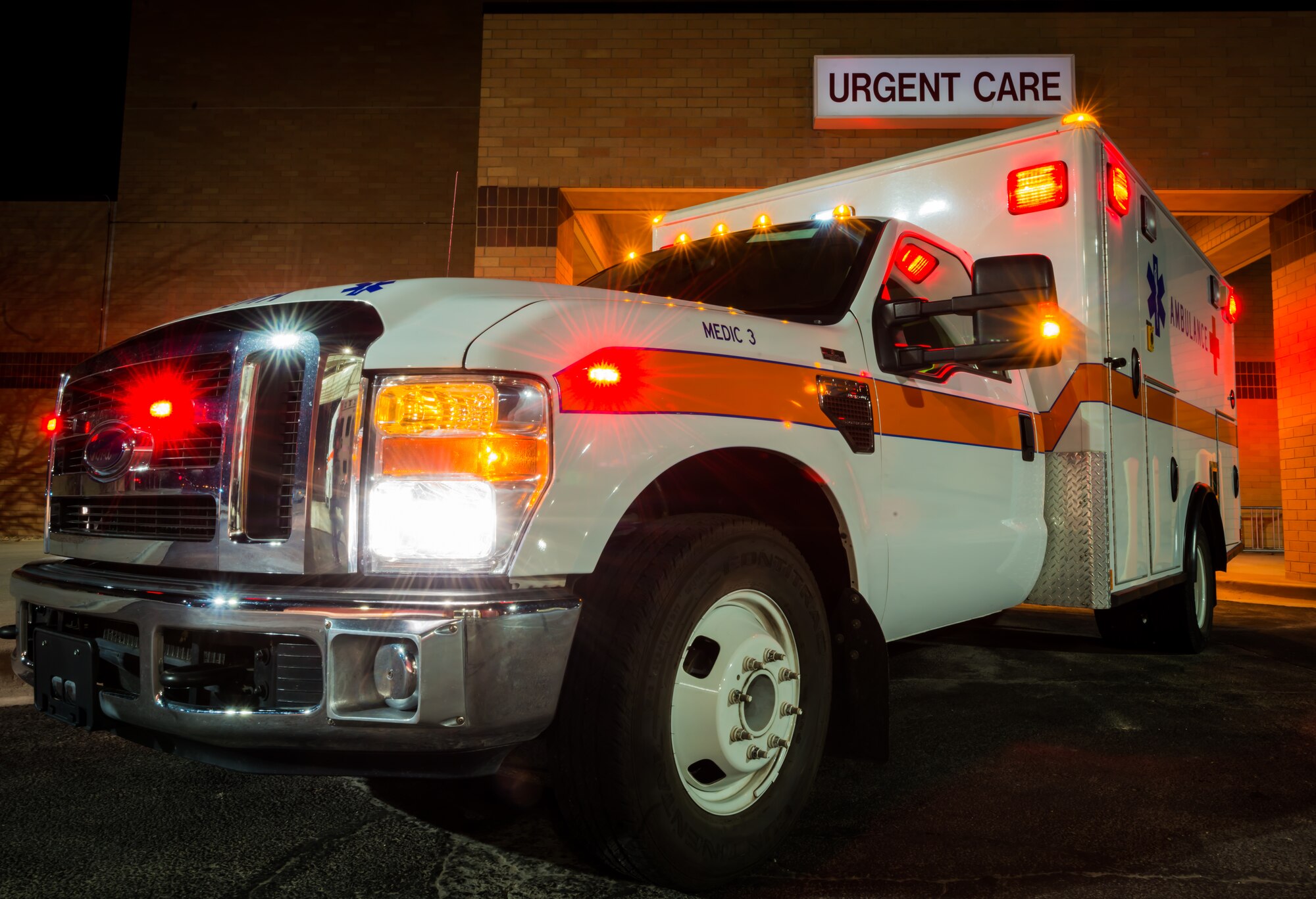 An ambulance sits outside the 366th Medical Group urgent care center at Mountain Home Air Force Base, Idaho, Feb. 19, 2015. Airmen are ready at all times to save lives of those in need. (U.S. Air Force photo by Airman Connor J Marth/RELEASED)