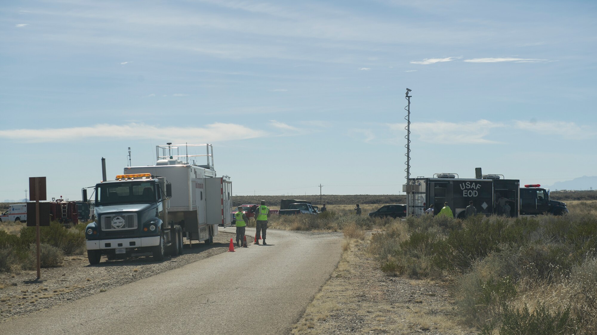 Various first responders stage themselves at a simulated aircraft accident scene during a Massive Accident Recovery Exercise at Holloman Air Force Base, N.M., Feb. 19. Holloman’s first responders participated in a MARE, which allows them to practice responding to such incidents so real world accidents can be dealt with quickly and efficiently. These exercises ensure that our Airmen are trained and prepared to handle real-world situations as they arise. (U.S. Air Force photo by Airman 1st Class Aaron Montoya / Released)
