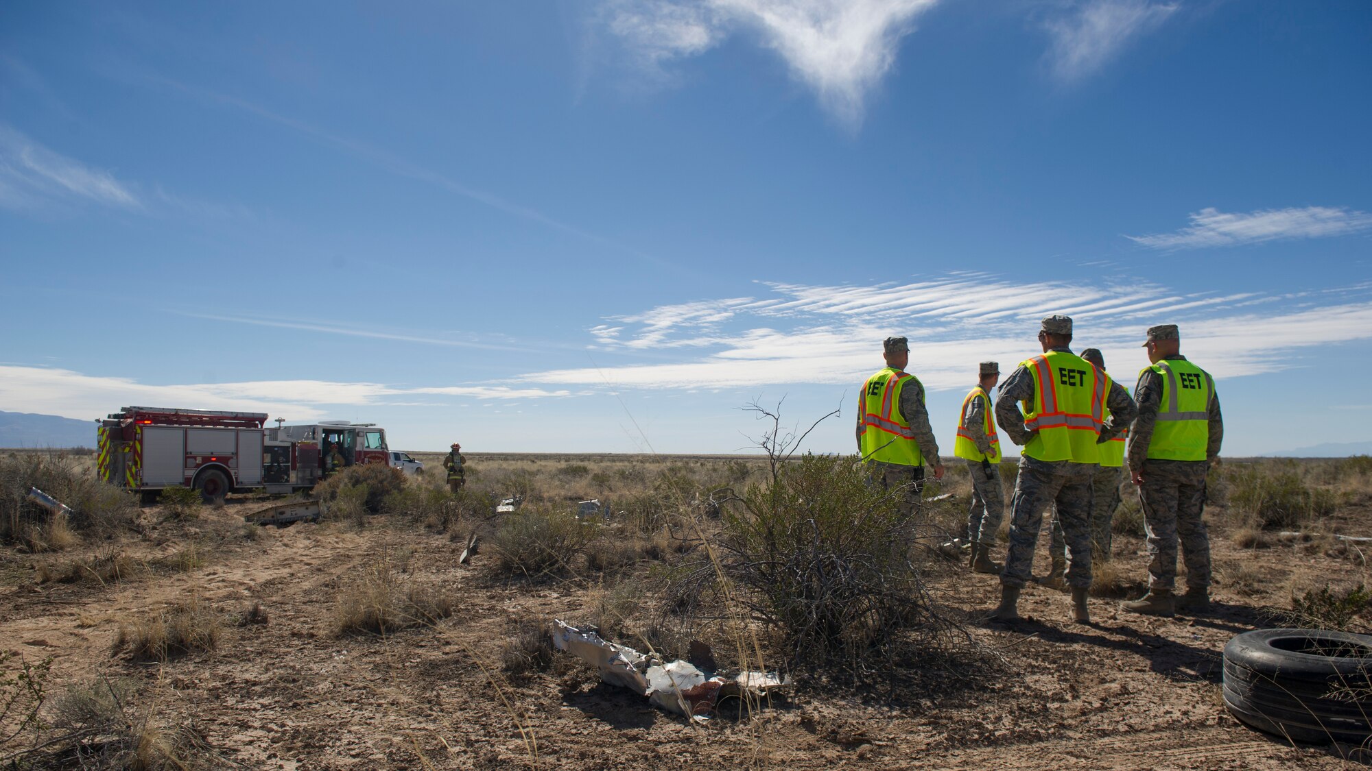 Members of the 49th Wing Inspection Team watch as Holloman’s first responders apply their training to a simulated aircraft accident during a Massive Accident Recovery Exercise at Holloman Air Force Base, N.M., Feb. 19. WIT members identify and document how well the participants do during the exercise so the various first responders have feedback on their performance. (U.S. Air Force photo by Airman 1st Class Aaron Montoya / Released)
