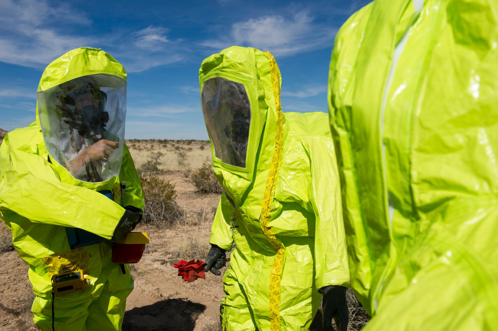 Members from the 49th Explosive Ordnance Disposal and Fuels Management flights share information after surveying a simulated aircraft accident during a Massive Accident Recovery Exercise at Holloman Air Force Base, N.M., Feb. 19. The MARE provides an important opportunity of hands-on experience for Holloman’s first responders to participate in. These exercises ensure that our Airmen are trained and prepared to handle real-world situations as they arise. (U.S. Air Force photo by Airman 1st Class Aaron Montoya / Released)