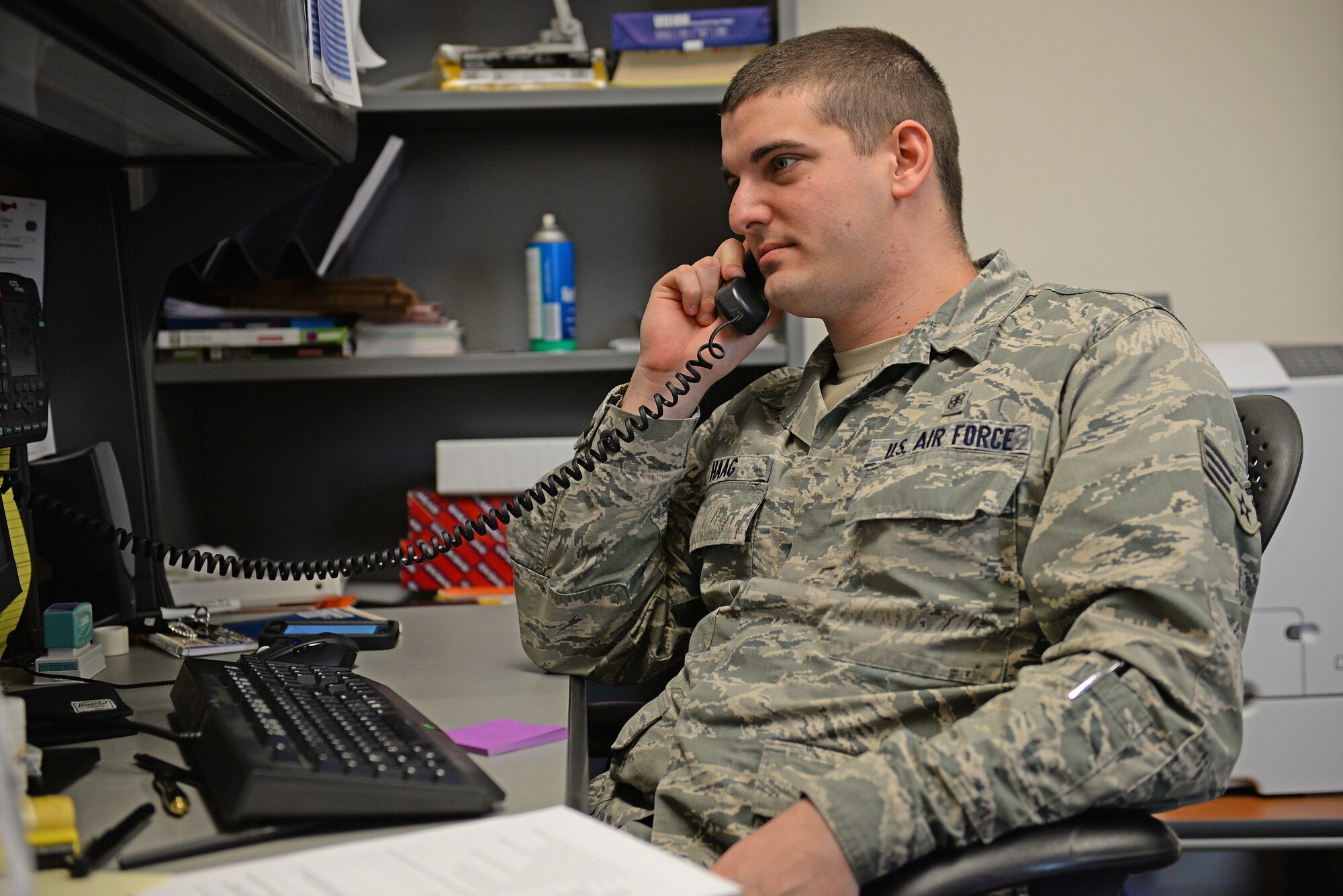Senior Airman Brandon Haag, 375th Medical Group mental health technician, answers a patient’s question, Feb. 9, 2015. Haag has been a technician for 5 years, and says he appreciates knowing how to ask the right questions to best help patients. (U.S. Air Force photo by Airman 1st Class Erica Crossen)