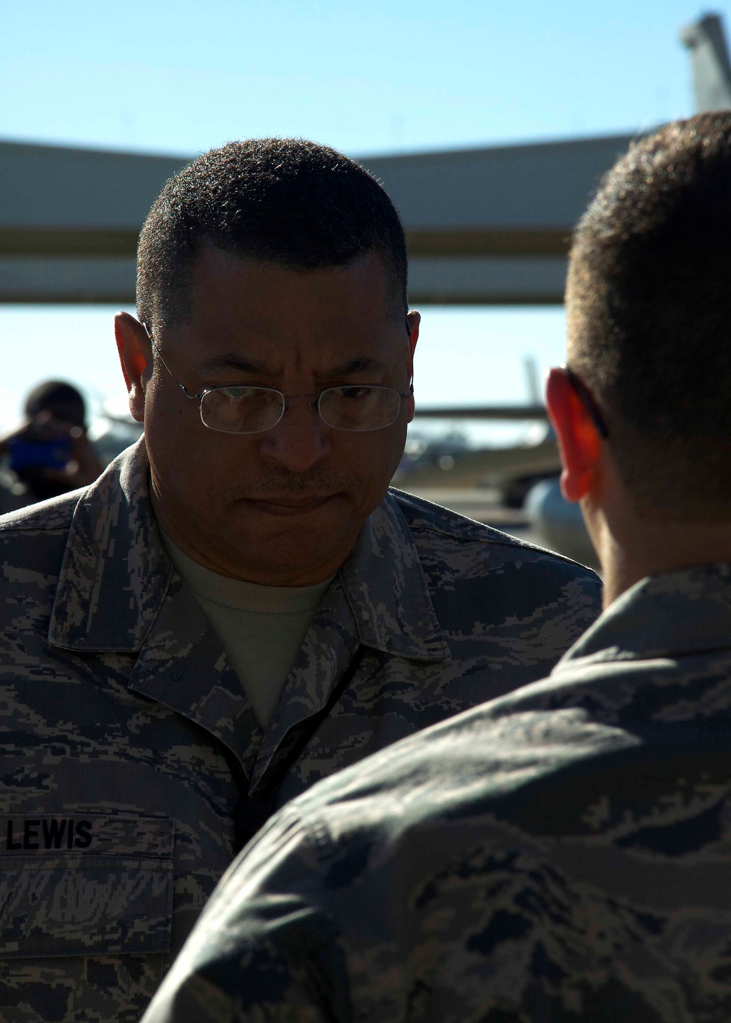 HOMESTEAD AIR RESERVE BASE, Fla. - Chief Master Sgt. Jerome Lewis, 10th Air Force Material Management Superintendent, Naval Air Station Fort Worth Joint Reserve Base, Texas, inspects the load crew team members individually during the 10th Air Force Load Competition Championship at Homestead Air Reserve Base, Fla., Feb. 19. The load crews are judged in four categories with the highest combined score determining the overall winner. The competition is graded based on an overall score in four different areas: dress and personal appearance, consolidated tool kit inspection, general knowledge test, and a competitive munitions load. (U.S. Air Force photo by Senior Airman Jaimi L. Upthegrove)