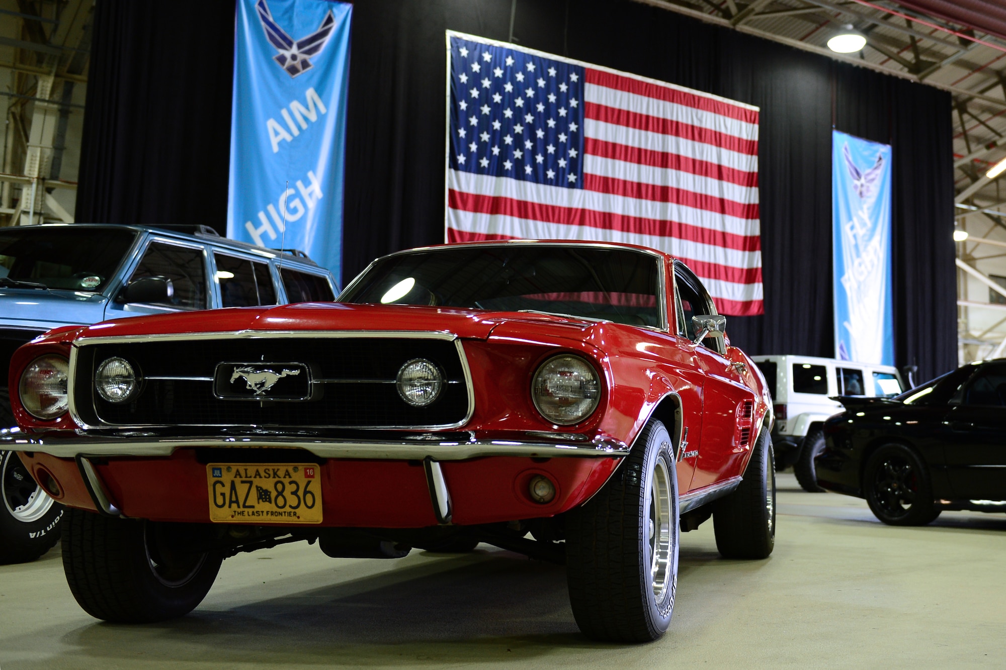 A 1967 Ford Mustang GT 390 big-block, restored by Tech. Sgt. Arturo De La Fuente, 48th Aircraft Maintenance Squadron section chief, is featured in the BBC Top Gear Magazine media visit at Royal Air Force Lakenheath, England, Feb. 19, 2015. A feature about Liberty Airmen and their cars will be published in the April 2015 issue. (U.S. Air Force photo by Airman 1st Class Erin R. Babis/Released)