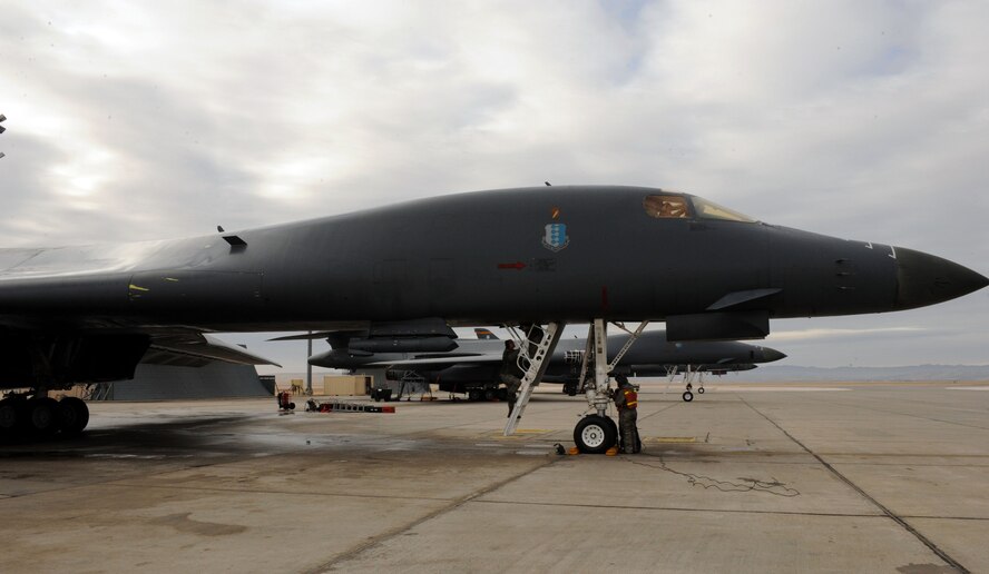 Airmen from the 28th Aircraft Maintenance Squadron perform maintenance on a B-1 bomber during Combat Hammer at Ellsworth Air Force Base, S.D., Feb. 12, 2015. B-1 aircrews from the 37th Bomb Squadron employed GBU-54 Laser Joint Direct Attack Munitions against moving targets during the Air Force air-to-ground Weapon System Evaluation program. (U.S. Air Force photo by Senior Airman Hailey R. Staker/Released)
