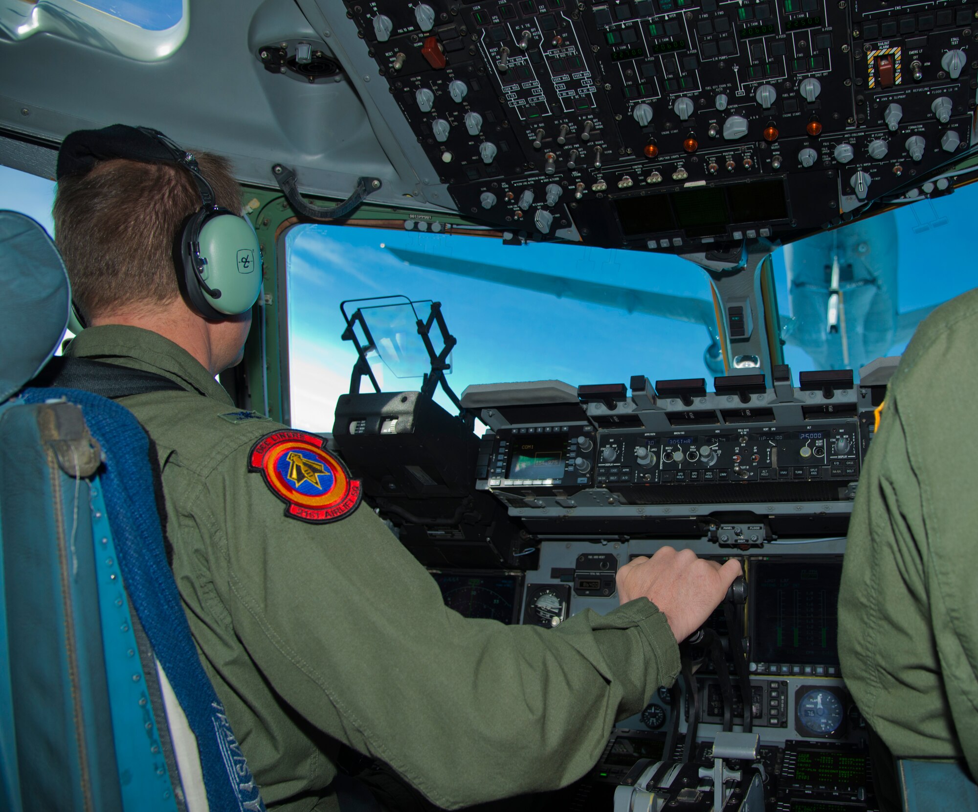 Col. Corey Martin, 60th Air Mobility Wing commander, refuels a KC-10 Extender during his fini-flight Feb. 17, 2015 over Northern California. (U.S. Air Force photo by Senior Airman Nicole Leidholm)