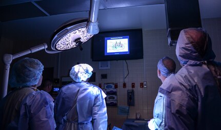 Surgeons in the Emergency War Surgery Course at Wilford Hall Ambulatory Surgical Center on Joint Base San Antonio-Lackland, Texas, listen to the advanced surgical skills for exposure in trauma lesson, Feb. 11, 2015. The Emergency War Surgery Course has been conducted at Wilford Hall since it was established back in 2004. (U.S. Air Force photo/Staff Sgt. Michael Ellis)