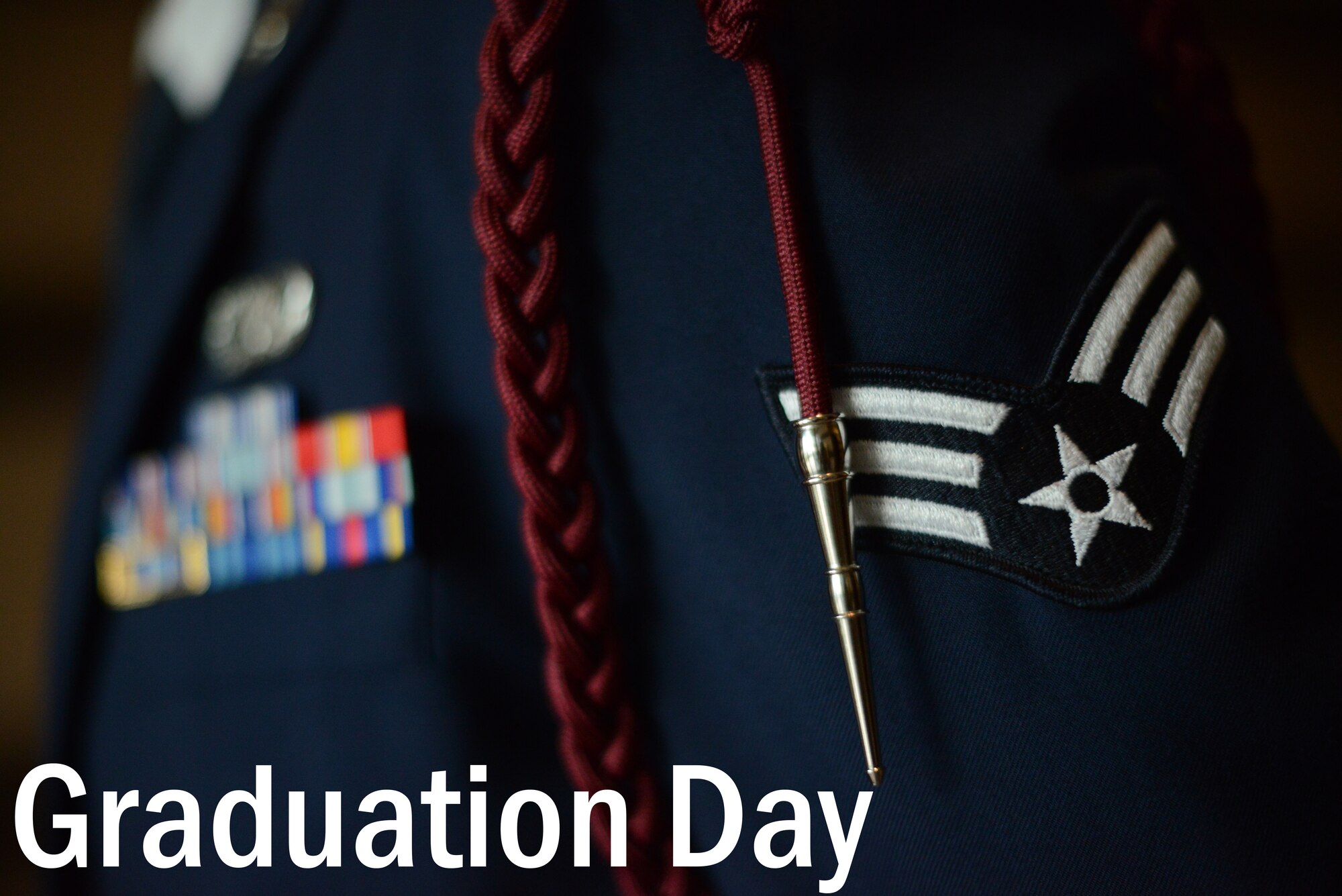 U.S. Air Force Senior Airman Adam Clark, 31st Communications Squadron cyber transport systems journeyman, waits for the commencement of an Airman Leadership School graduation, Feb. 12, 2015, at Aviano Air Base, Italy.  ALS is the first professional military education course Airmen attend during their military career. (U.S. Air Force photo by Staff Sgt. Evelyn Chavez/Released) 