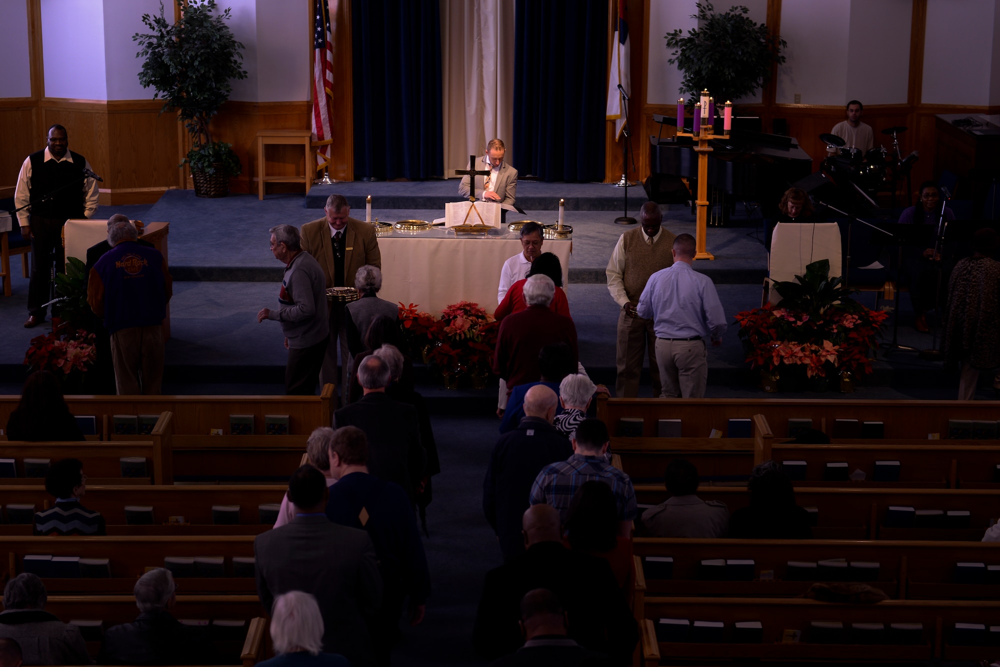 Chaplain Capt. Matthew Spencer prepares to read a Bible verse before Communion Jan. 4, 2015, at Little Rock Air Force Base, Ark. Spencer is filling the protestant chaplain position at Little Rock Air Force Base, while the active-duty chaplain is deployed.  (U.S. Air Force photo by Senior Airman Kaylee Clark)