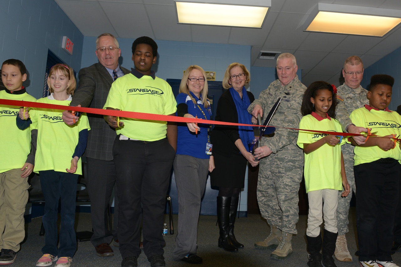 Cold Spring School students and officials cut the ribbon to officially open the STARBASE Indianapolis campus, Feb. 20, 2015. Indiana National Guard photo by Army Sgt. 1st Class Jeff Lowry