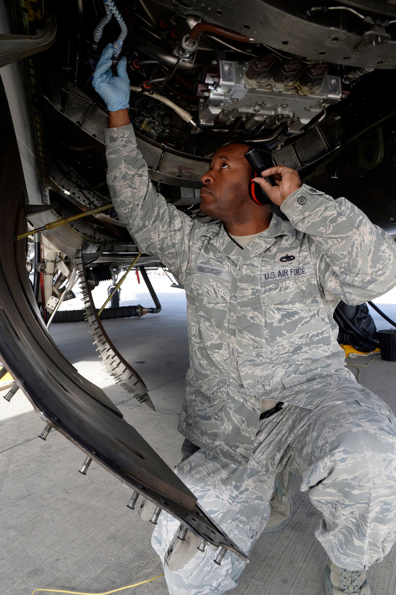 Tech. Sgt. Lawrence, Quality Assurance inspector, performs a Key Task Listing inspection on an F-22 Raptor engine at an undisclosed location in Southwest Asia Feb. 18, 2015. The QA teams are responsible for training and inspecting the maintainers here on six different airframes. Lawrence is currently deployed from Tyndall Air Force Base, Fla., and is a native of Detroit, Mich. (U.S. Air Force photo/Tech. Sgt. Marie Brown)