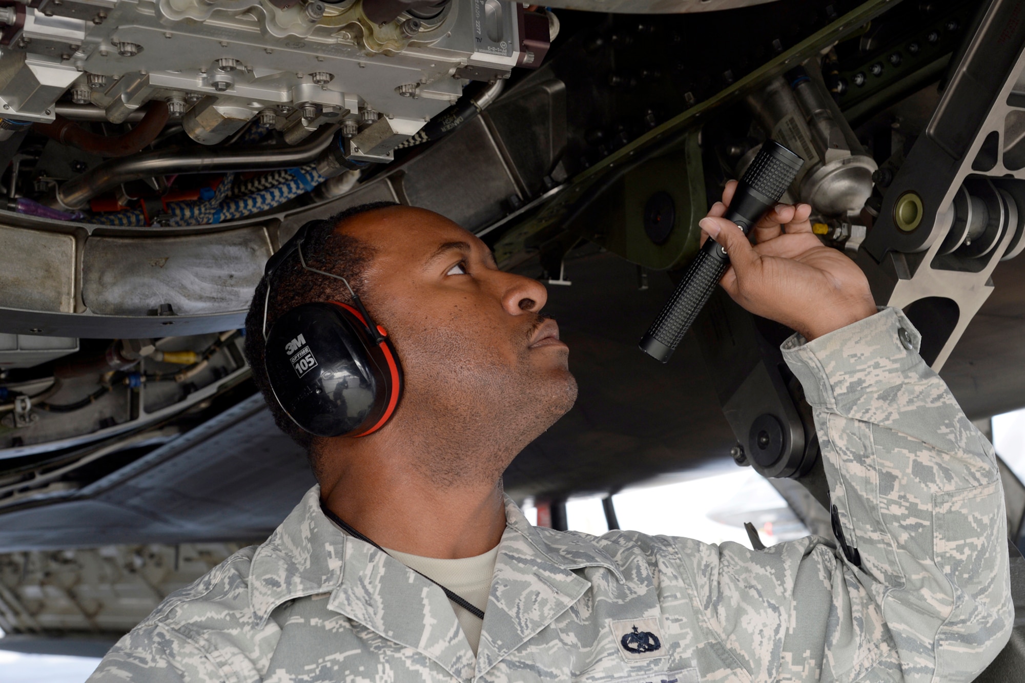 Tech. Sgt. Lawrence, Quality Assurance inspector, performs a Key Task Listing inspection on an F-22 Raptor engine at an undisclosed location in Southwest Asia Feb. 18, 2015. QA is comprised of every specialty within the maintenance group, including crew chiefs and the fabrication flight, and are responsible for performing inspections as well as maintaining every special maintenance program for the wing and group. Lawrence is currently deployed from Tyndall Air Force Base, Fla., and is a native of Detroit, Mich. (U.S. Air Force photo/Tech. Sgt. Marie Brown)