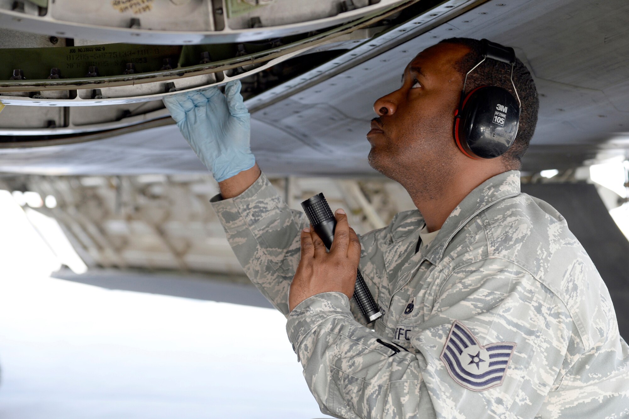 Tech. Sgt. Lawrence, Quality Assurance inspector, performs a Key Task Listing inspection on an F-22 Raptor engine at an undisclosed location in Southwest Asia Feb. 18, 2015. QA is also responsible for the foreign object damage awareness and dropped object prevention program at two other locations in our area of responsibility. Lawrence is currently deployed from Tyndall Air Force Base, Fla., and is a native of Detroit, Mich. (U.S. Air Force photo/Tech. Sgt. Marie Brown)