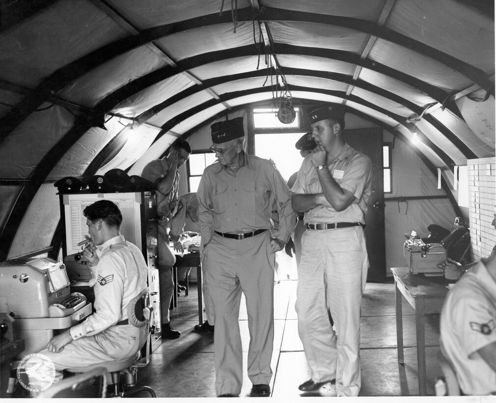 1957-1958 Era; 263rd Comm Sq Annual Field Training; Site is either in Wadesboro NC or Fort Knox KY, TAG Visiting and escorted; Left to Right, #1 Unk, #2 Unk, #3 Unk, #4 TAG, MG Capus Waynick, #5 (In Background) Unk, #6 Unk, #7 Unk (Photo by NCANG Heritage Program)