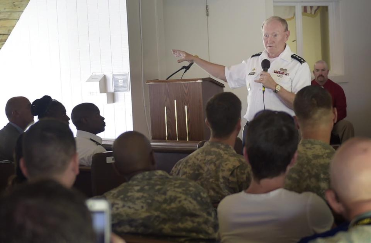 Army Gen. Martin E. Dempsey, chairman of the Joint Chiefs of Staff, discusses the threat posed by the Islamic State of Iraq and the Levant during a town hall meeting at the U.S. Army Kwajalein Atoll/Ronald Reagan Ballistic Missile Defense Test Site in Kwajalein Atoll in the Marshall Islands, Feb. 21, 2015. DoD photo