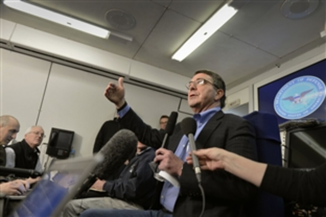 U.S. Defense Secretary Ash Carter meets with reporters while en route to Afghanistan during his first overseas trip as secretary, Feb. 20, 2015. Carter said he planned to connect with Afghan leaders and assess the situation on the ground. 