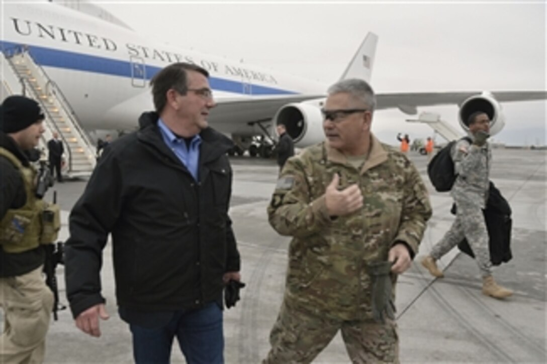 U.S. Defense Secretary Ash Carter talks with U.S. Army Gen. John F. Campbell, commander of U.S. forces in Afghanistan and Operation Resolute Support after arriving in Kabul, Afghanistan, Feb. 21, 2015. During his first overseas trip as secretary, Carter plans to meet with Afghan leaders and U.S. service members.