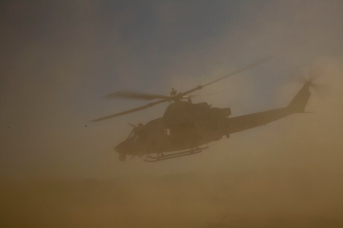 Col. David L. Odom and Cpl. Christopher J. Benavidez take off in a UH-1Y Venom helicopter to command the fight from the sky Feb. 12 at Marine Air Ground Combat Center Twentynine Palms, California, during the battalion assault course as part of Integrated Training Exercise 2-15. Benavidez provided Odom with communication to the supporting elements and the combat operations center during the flight. ITX 2-15 is designed to integrate combined arms and improve warfighting capabilities.  Benavidez, a Livermore, California, native, is a radio operator with Headquarters Company, 4th Marine Regiment, 3rd Marine Division, III Marine Expeditionary Force. Odom, a Hartsville, South Carolina, native, is the commanding officer for 4th Marines and Special Purpose Marine Air-Ground Task Force Four during ITX 2-15. 