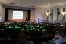 More than 200 Team McChord enlisted and officers listen to the changes in the Enlisted Professional Military Education at a formal training town hall at the McChord Theater, Joint Base Lewis-McChord, Wash., Feb. 19, 2015. After the formal training brief, Airmen had a chance to get their questions answered by the command chief, 627th Air Base Group chief, 627th Force Support Squadron chief and various other subject matter experts. (U.S. Air Force photo/Staff Sgt. Tim Chacon)