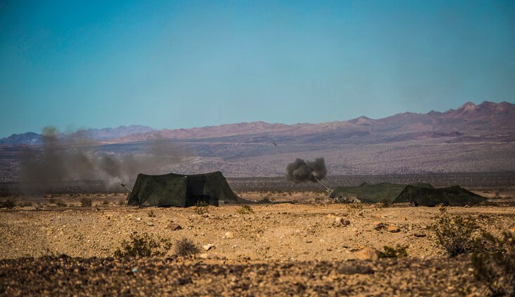 Artillery provides suppressing fire from multiple kilometers away Feb. 9 at Marine Air Ground Combat Center Twentynine Palms, California, during the Battalion Assault Course as part of Integrated Training Exercise 2-15. Artillery fire allows other ground combat elements and aerial combat elements to move during combat without taking fire from the enemy. The Marines firing are with 1st Battalion, 12th Marine Regiment, but are currently attached to 3rd Battalion, 12th Marines, 3rd Marine Division, III Marine Expeditionary Force for ITX 2-15. 
