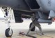 An Airman prepares an F-15E Strike Eagle for hot pit refueling Feb. 10, 2015, at Seymour Johnson Air Force Base, N.C. Hot pit refueling alleviates stress on an aircraft’s engines by reducing the number of times they are switched on and off. The Airmen is assigned to the 335th Aircraft Maintenance Unit and the F-15E is assigned to the 335th Fighter Squadron. (U.S. Air Force photo/Senior Airman Ashley J. Thum)