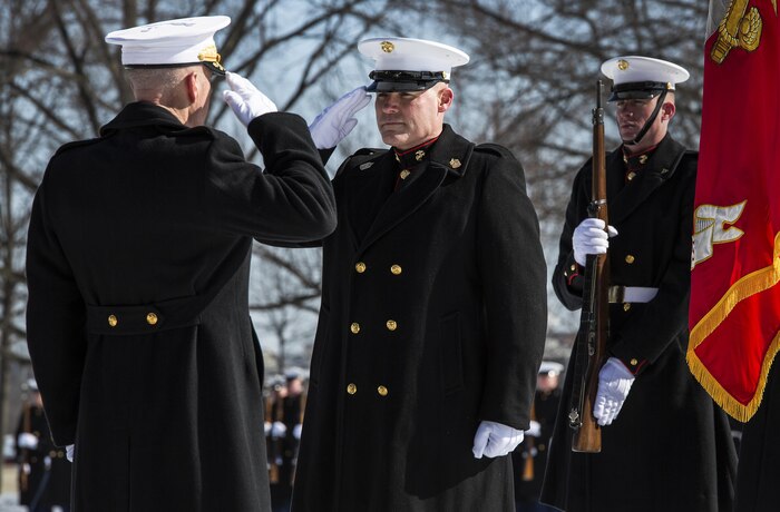 Sgt. Maj. Micheal P. Barrett salutes Gen. Joseph F. Dunford Jr. during his relief as Sgt. Maj. of the Marine Corps at the Marine Corps War Memorial, Arlington, Va., Feb. 20, 2015. The post of Sergeant Major of the Marine Corps was established in 1957 as the senior enlisted advisor to the Commandant of the Marine Corps, the first such post in any of the branches of the United States Armed Forces. (U.S. Marine Corps photo by Lance Cpl. Remington Hall/Released)