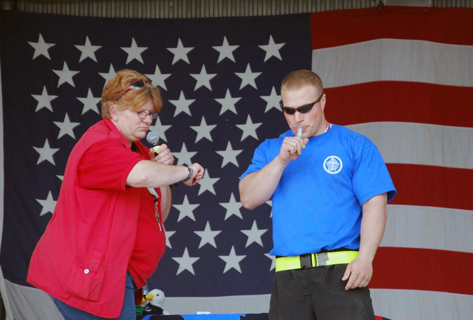 Army Spc. Nicolas Salvaggio of the North Dakota National Guard shows off his duck-calling skills on stage on Camp Bondsteel, Kosovo, for a Memorial Day weekend Morale Welfare and Recreation duck-calling contest May 30, 2010.