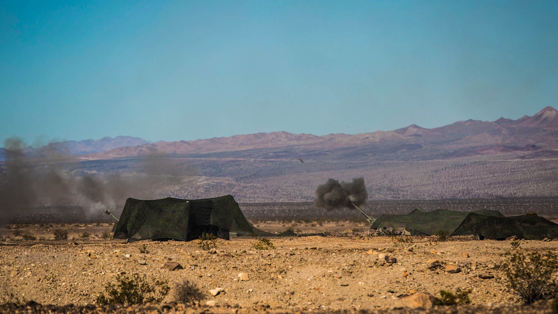 Artillery provides suppressing fire from multiple kilometers away Feb. 9 at Marine Air Ground Combat Center Twentynine Palms, California, during the Battalion Assault Course as part of Integrated Training Exercise 2-15. Artillery fire allows other ground combat elements and aerial combat elements to move during combat without taking fire from the enemy. The Marines firing are with 1st Battalion, 12th Marine Regiment, but are currently attached to 3rd Battalion, 12th Marines, 3rd Marine Division, III Marine Expeditionary Force for ITX 2-15.